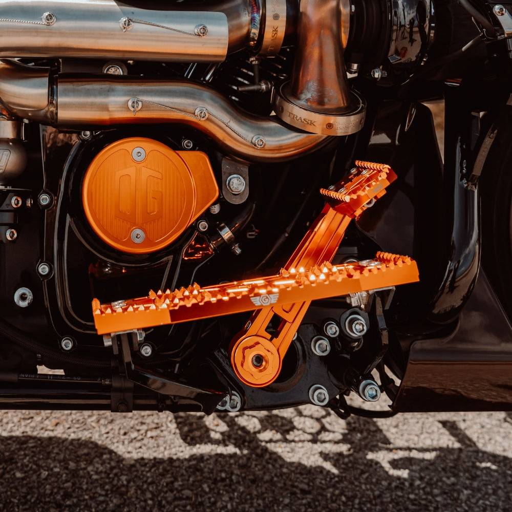 orange OG Billet Pivot Cover installed on our Orange OG Adjustable Brake Arm. Installed on a 2024 Turbo Road Glide